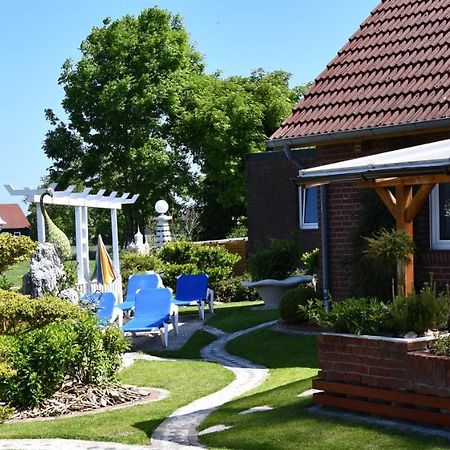 Garni Hotel-Pension Holum Нойхарлингерзиль Экстерьер фото