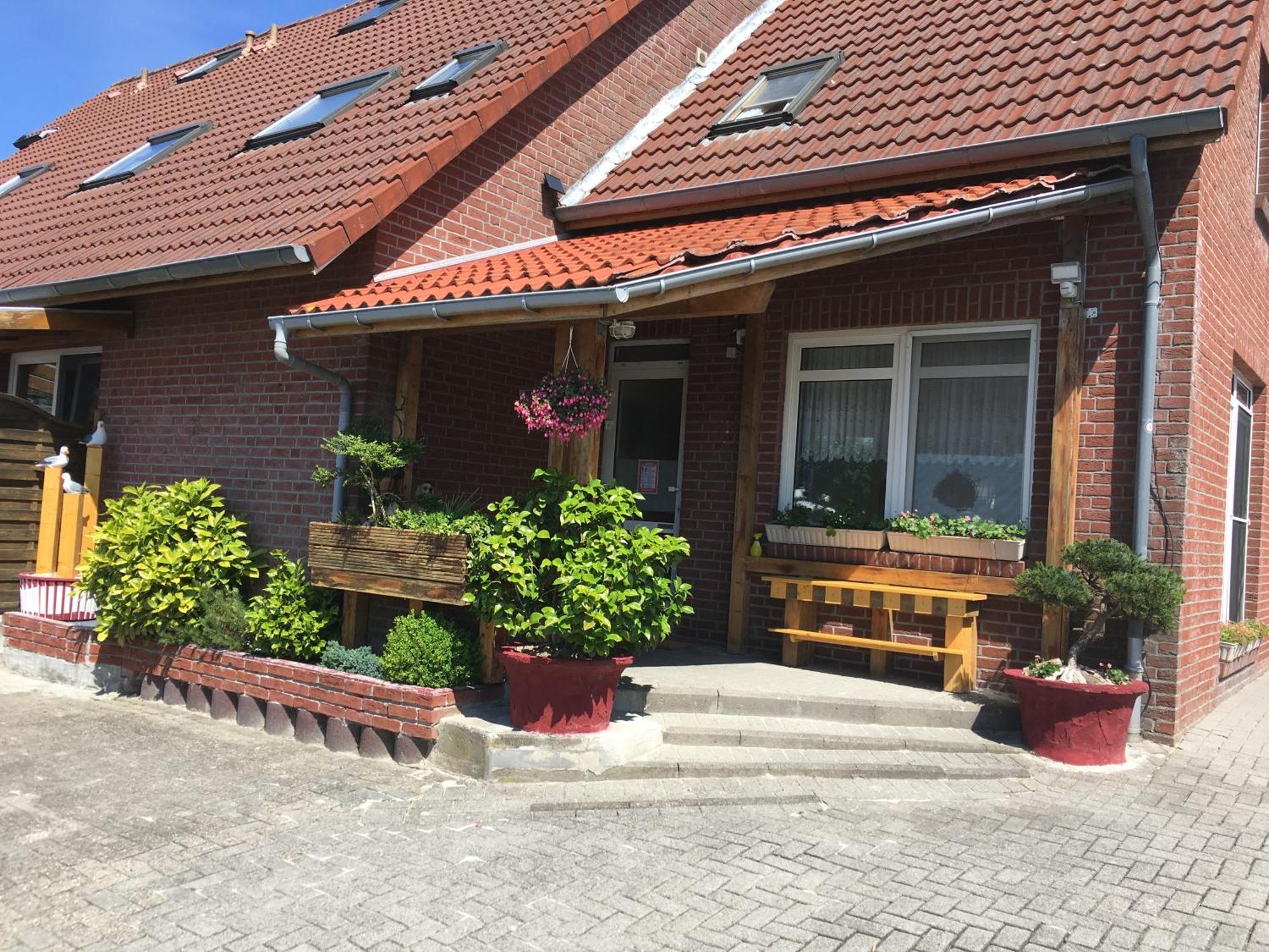 Garni Hotel-Pension Holum Нойхарлингерзиль Экстерьер фото