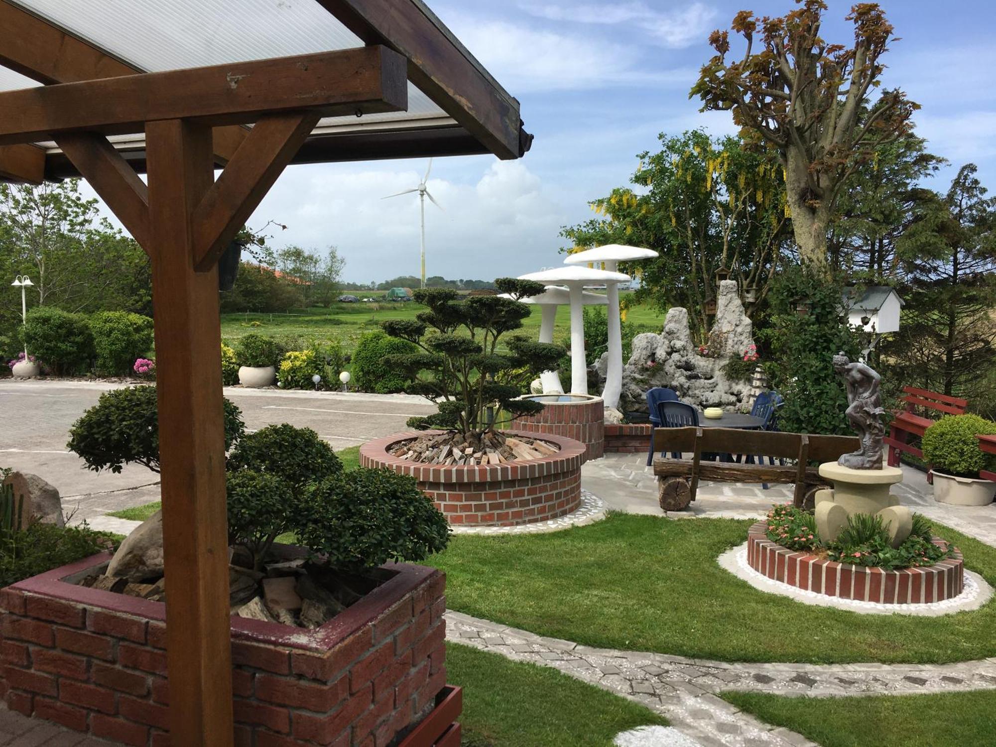 Garni Hotel-Pension Holum Нойхарлингерзиль Экстерьер фото